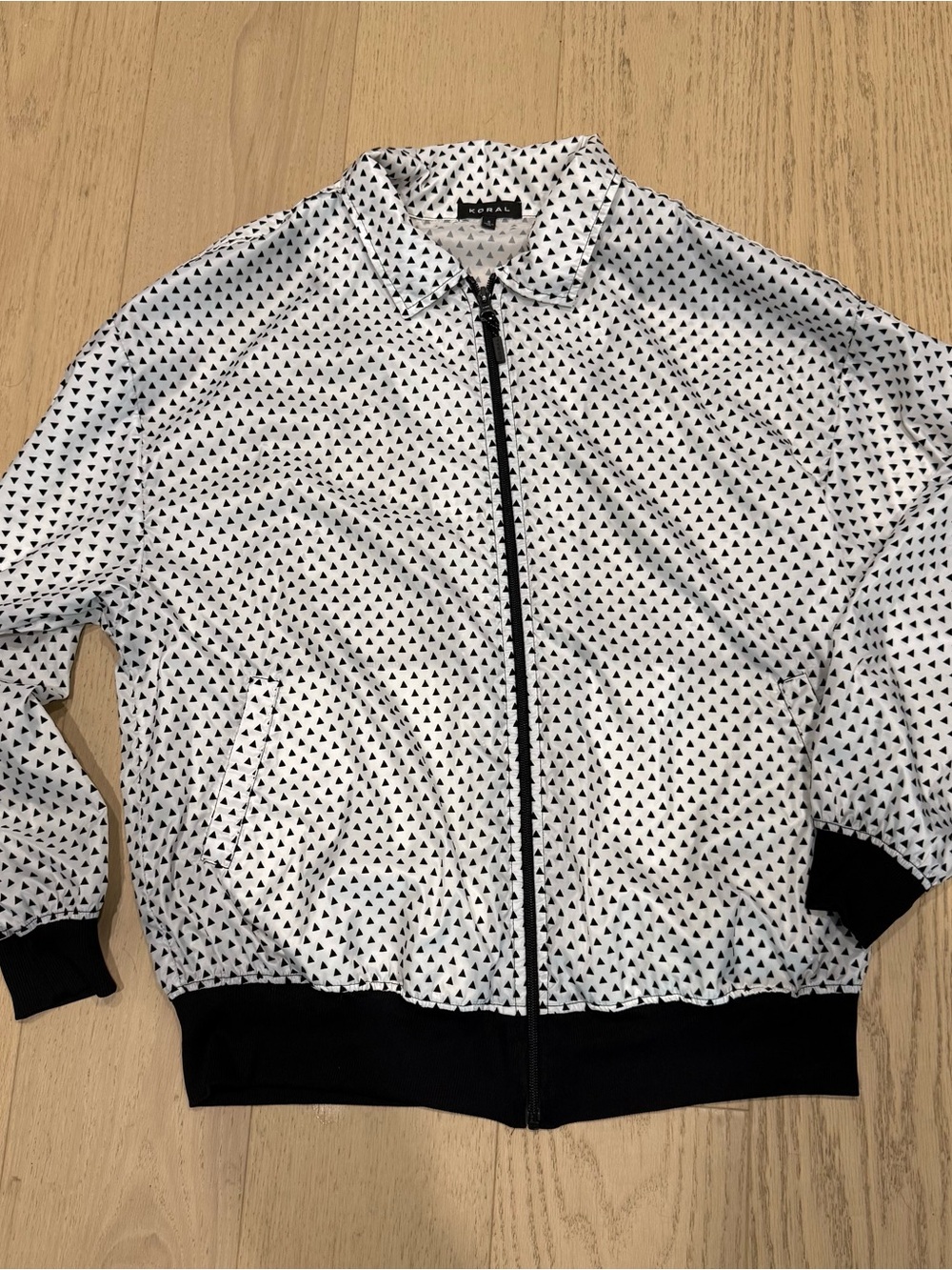 Koral White Bomber windbreaker with Black flocked Triangle Print